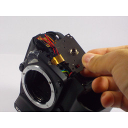 Замена резьбовой пластины штатива Nikon D90